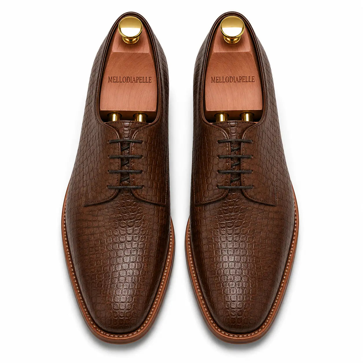 Melodiapelle Meta Wholecut Oxford in taupe brown croc-embossed leather, pair top-down view, handcrafted in Agra