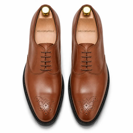 Melodiapelle Meta Wholecut Oxford in tan leather, pair top-down view, handcrafted in Agra