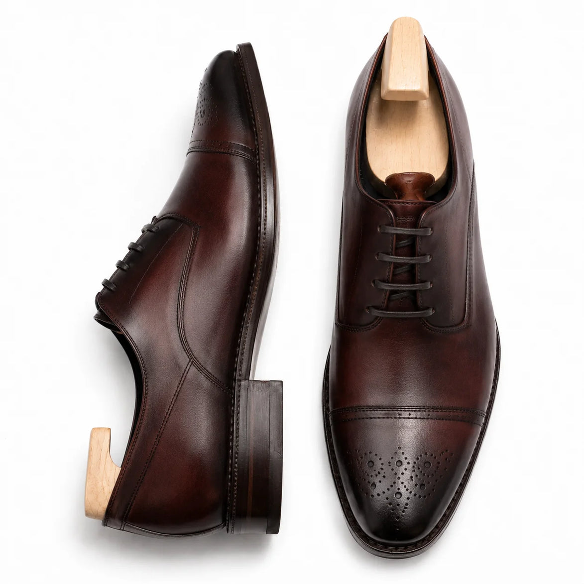 Oxblood bordeaux leather wholecut Oxford, three-quarter angle showing heel and toe detailing