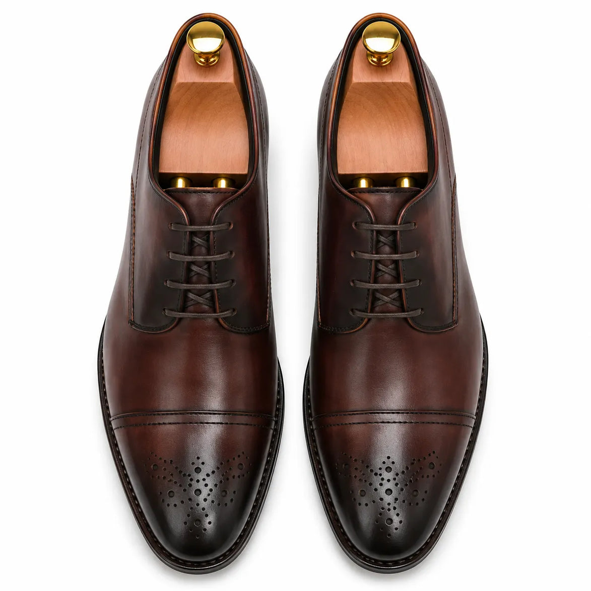 Melodiapelle Meta Wholecut Oxford in oxblood bordeaux leather, pair top-down view, handcrafted in Agra