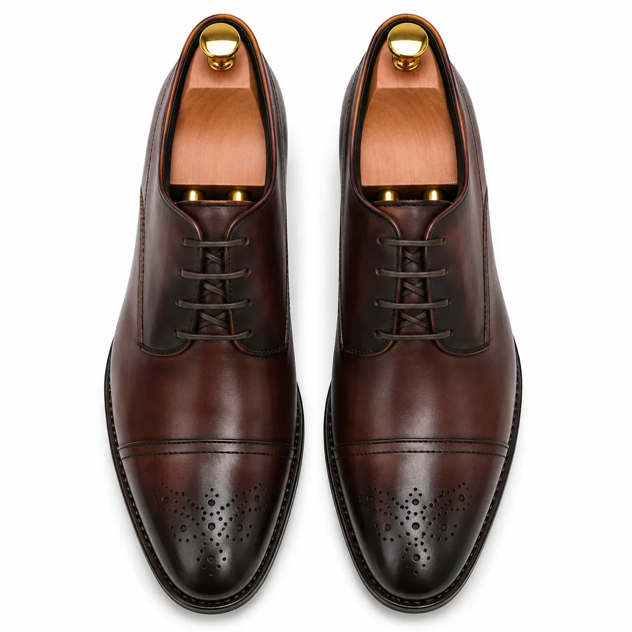 Melodiapelle Meta Wholecut Oxford in oxblood bordeaux leather, pair top-down view, handcrafted in Agra