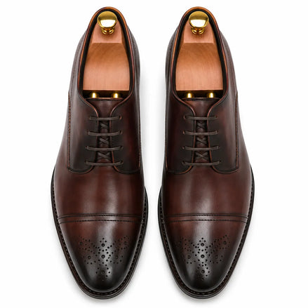 Melodiapelle Meta Wholecut Oxford in oxblood bordeaux leather, pair top-down view, handcrafted in Agra