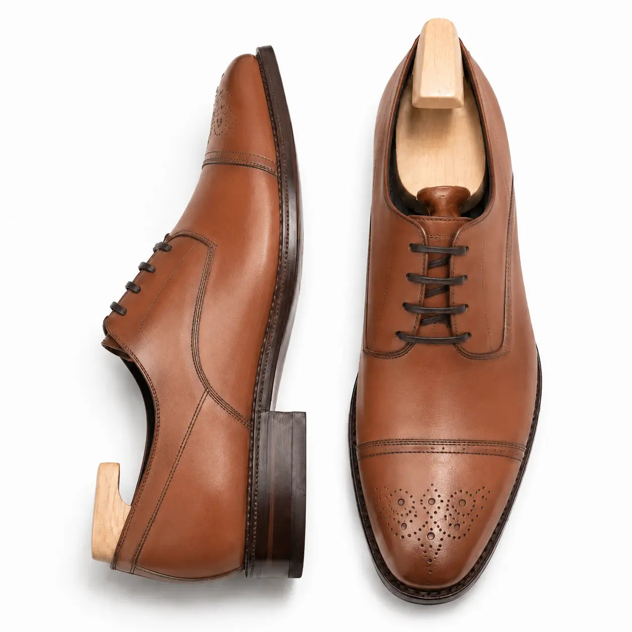 Tan leather wholecut Oxford, three-quarter angle showing heel and toe detailing