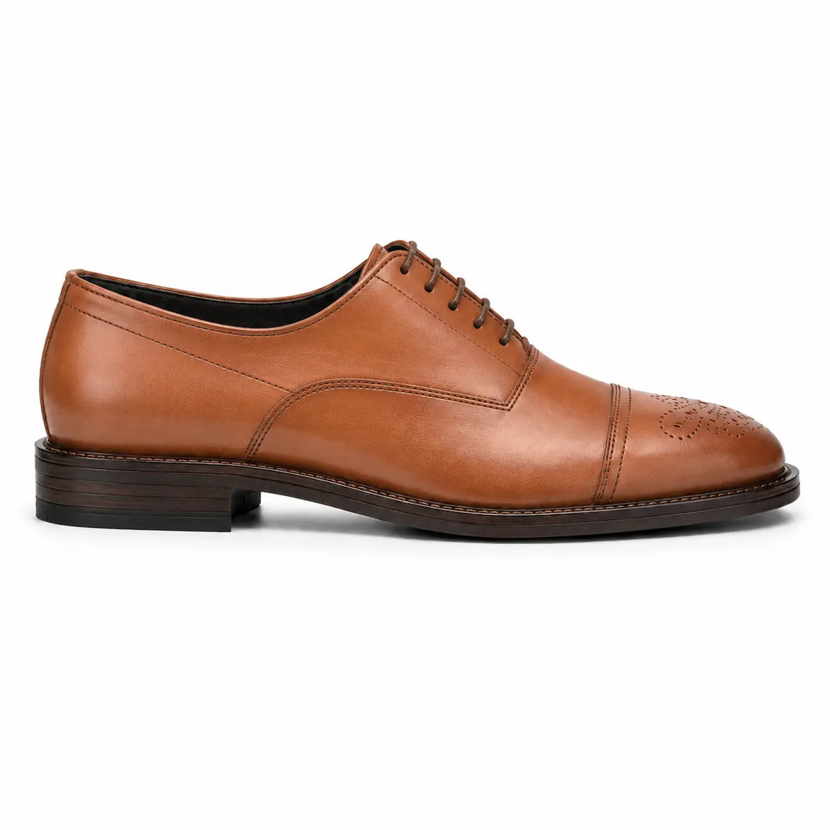 Side profile of the Meta Wholecut Oxford in tan leather on white background