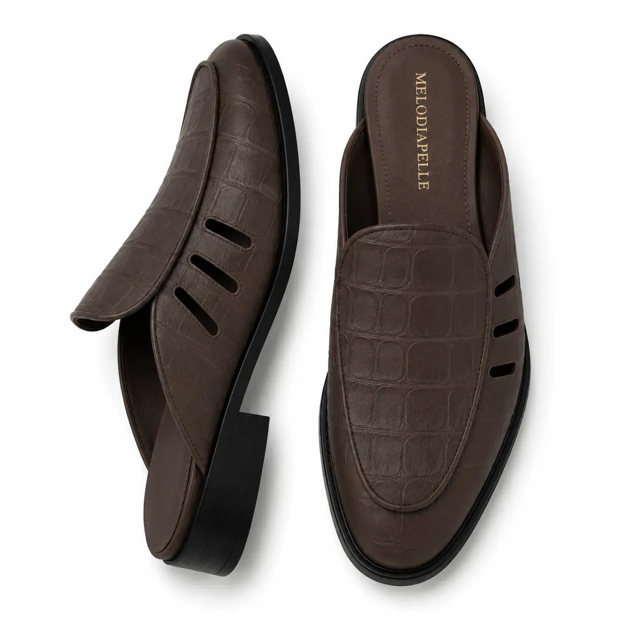 Dark brown leather perforated mule, three-quarter angle showing heel and cut-out strap detailing