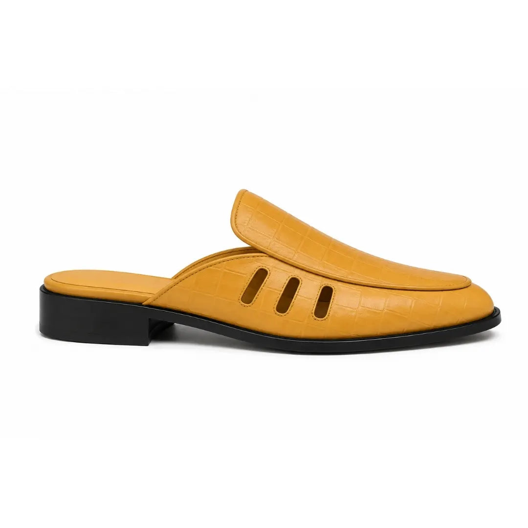 Side profile of the Miami Mule in mustard yellow leather on white background