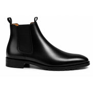 Side profile of the Michigan Chelsea Boot in black leather on white background