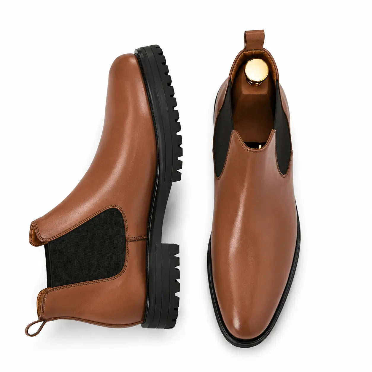 Tan leather Chelsea boot, three-quarter angle showing heel and elastic side panel