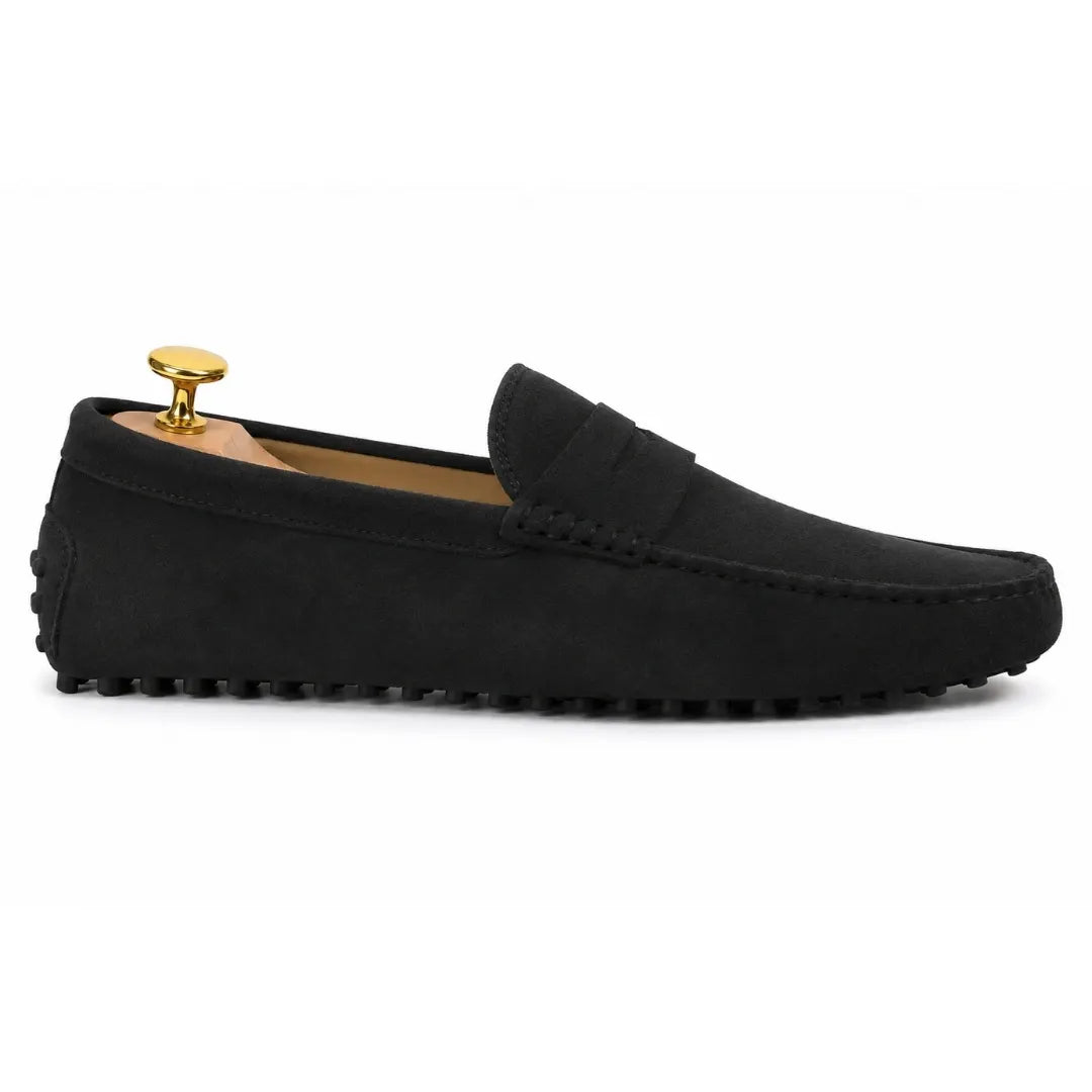 Side profile of the Michigan Loafer in black suede on white background