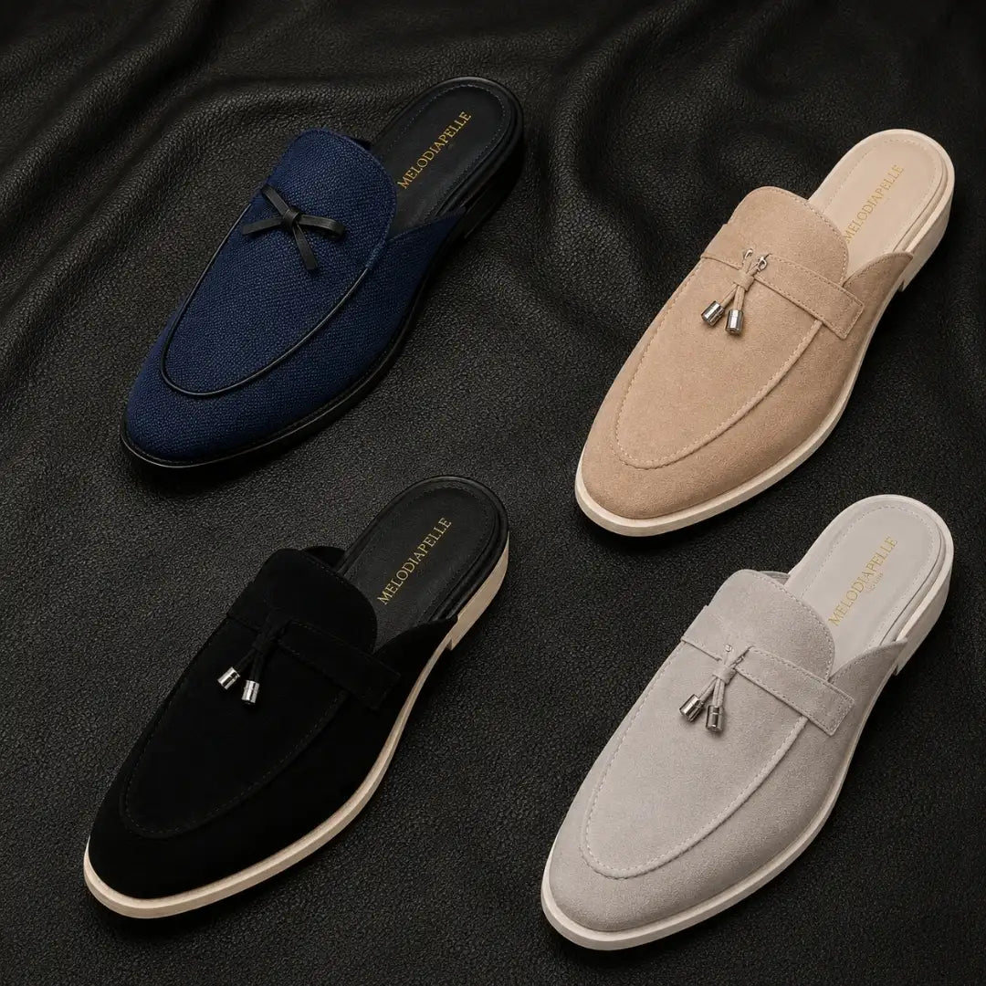 Melodiapelle Micol Mule collection in black, brown and tan suede, handcrafted tassel mule loafers displayed together