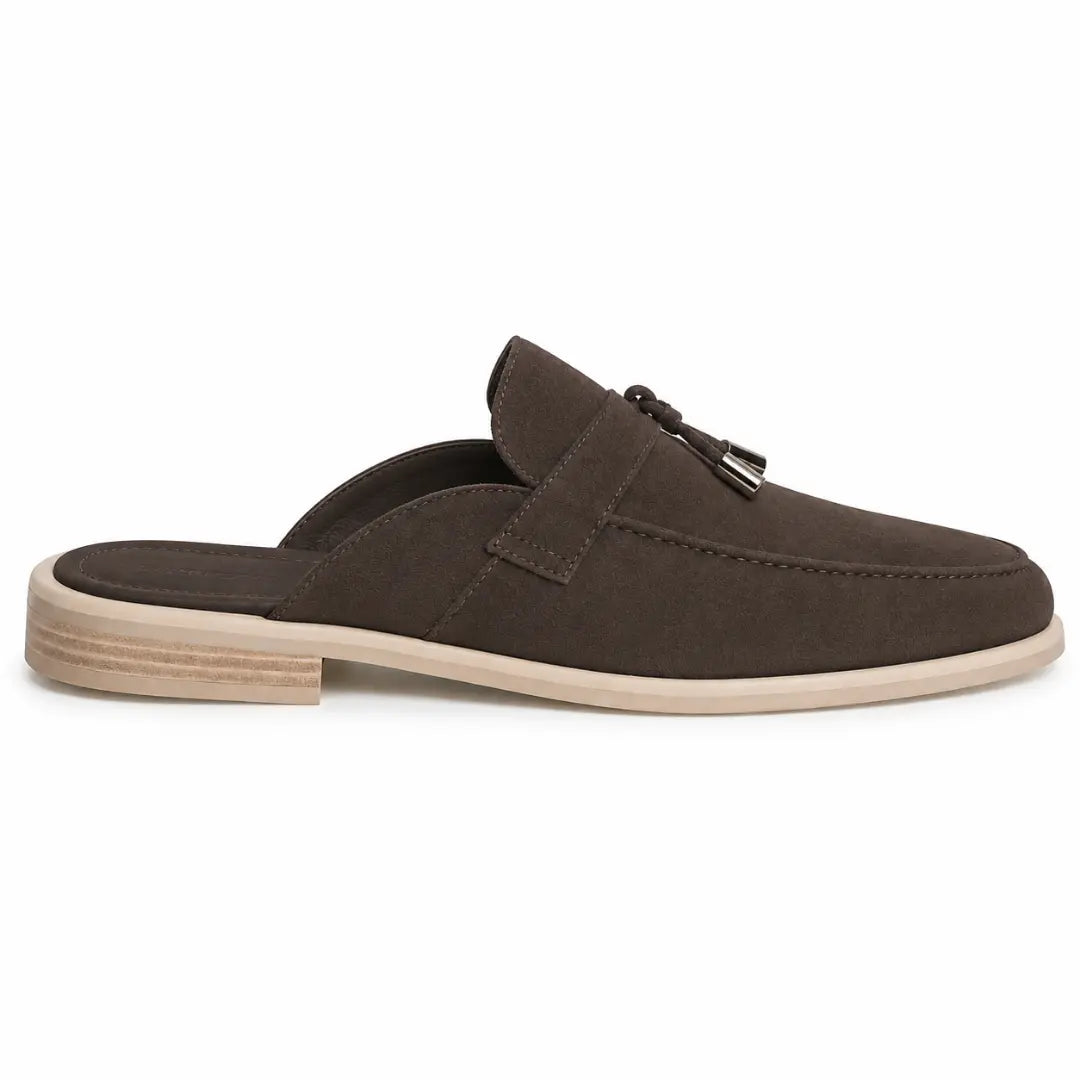 Side profile of the Micol Mule in dark brown suede on white background