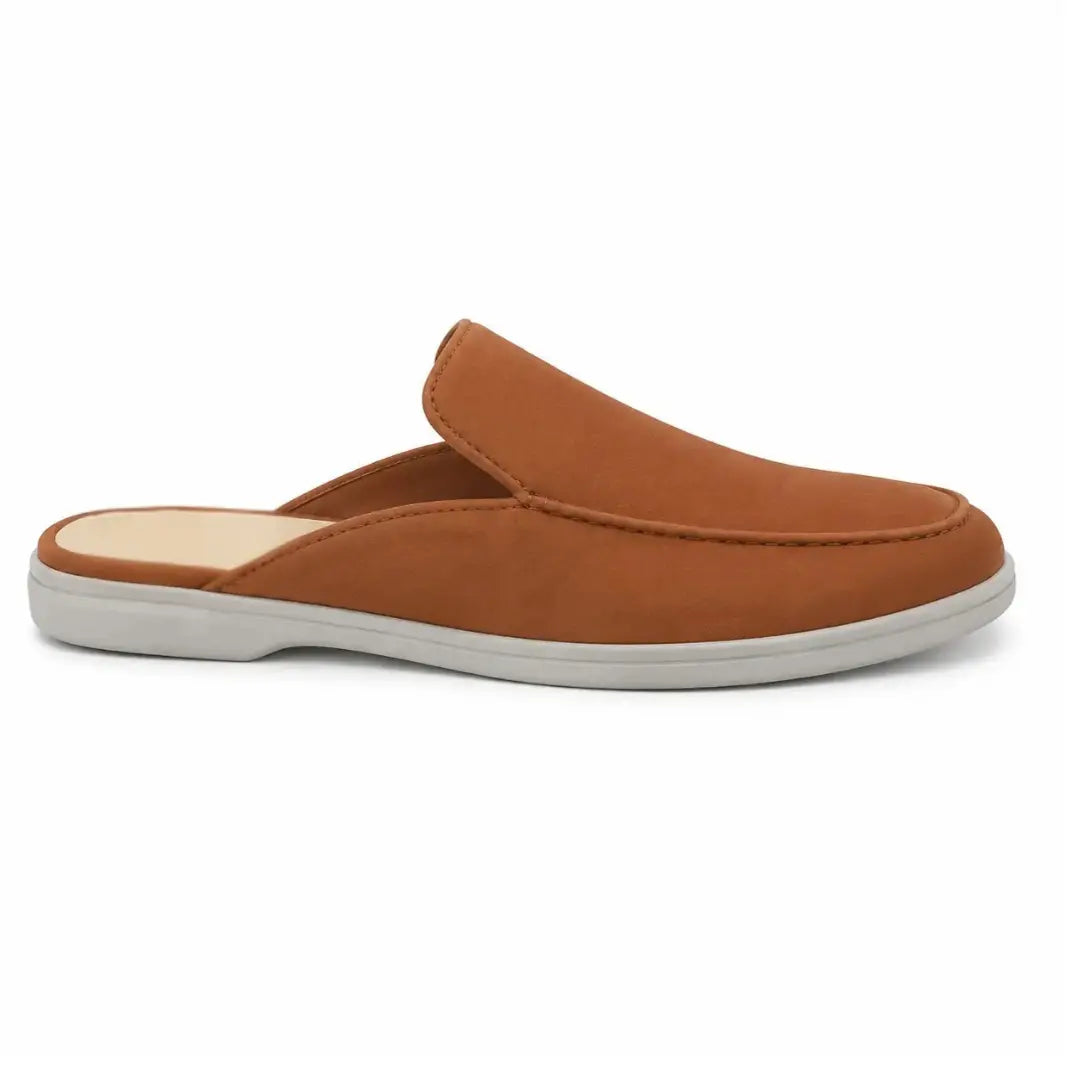 Side profile of the Mila Mule in rust tan suede on white background