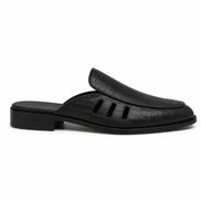 Side profile of the Milan Mule in black embossed leather on white background