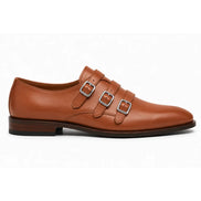 Side profile of the Milan Triple Monk Strap Loafer in tan leather on white background