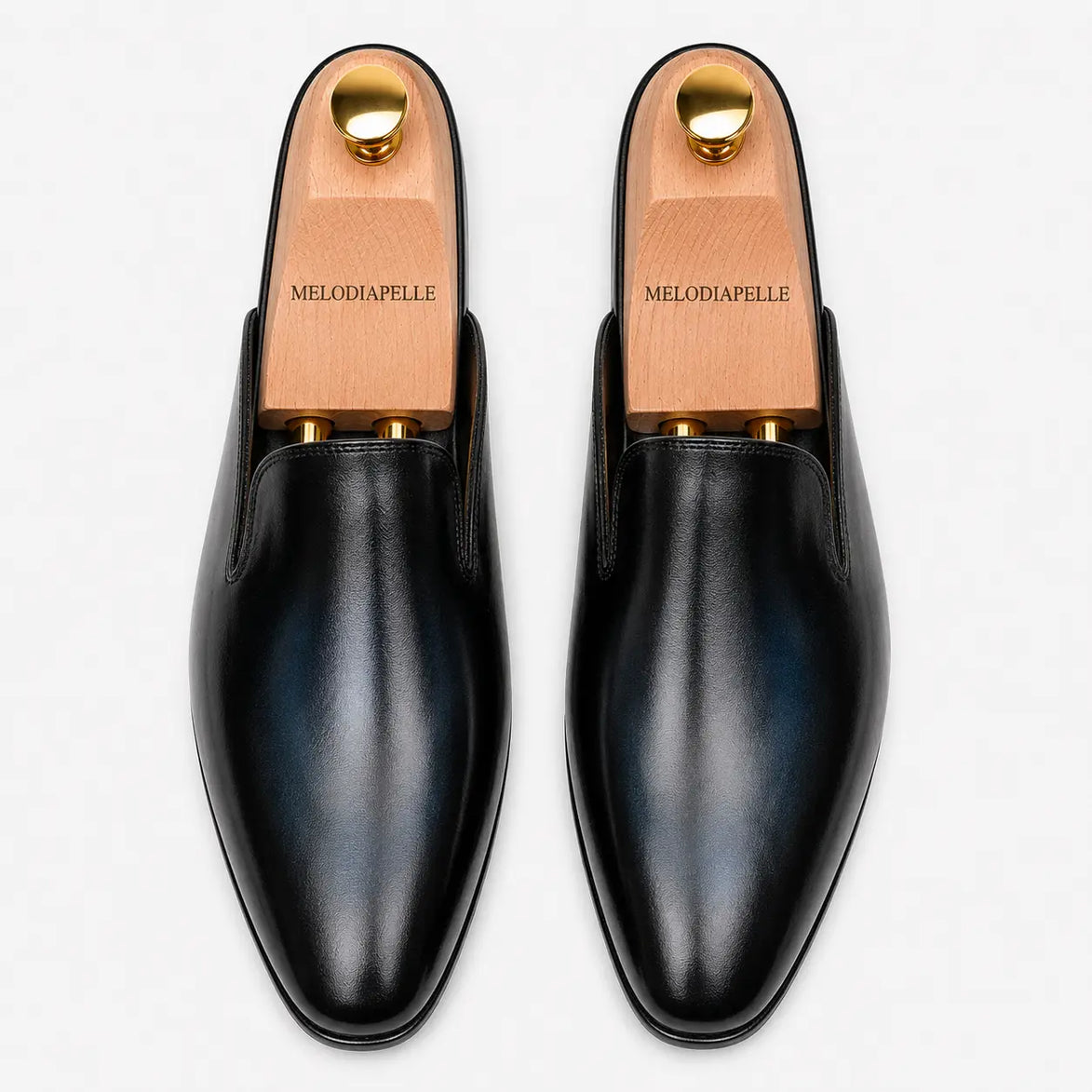 Melodiapelle Millburn Mule in navy blue leather, pair top-down view, handcrafted in Agra