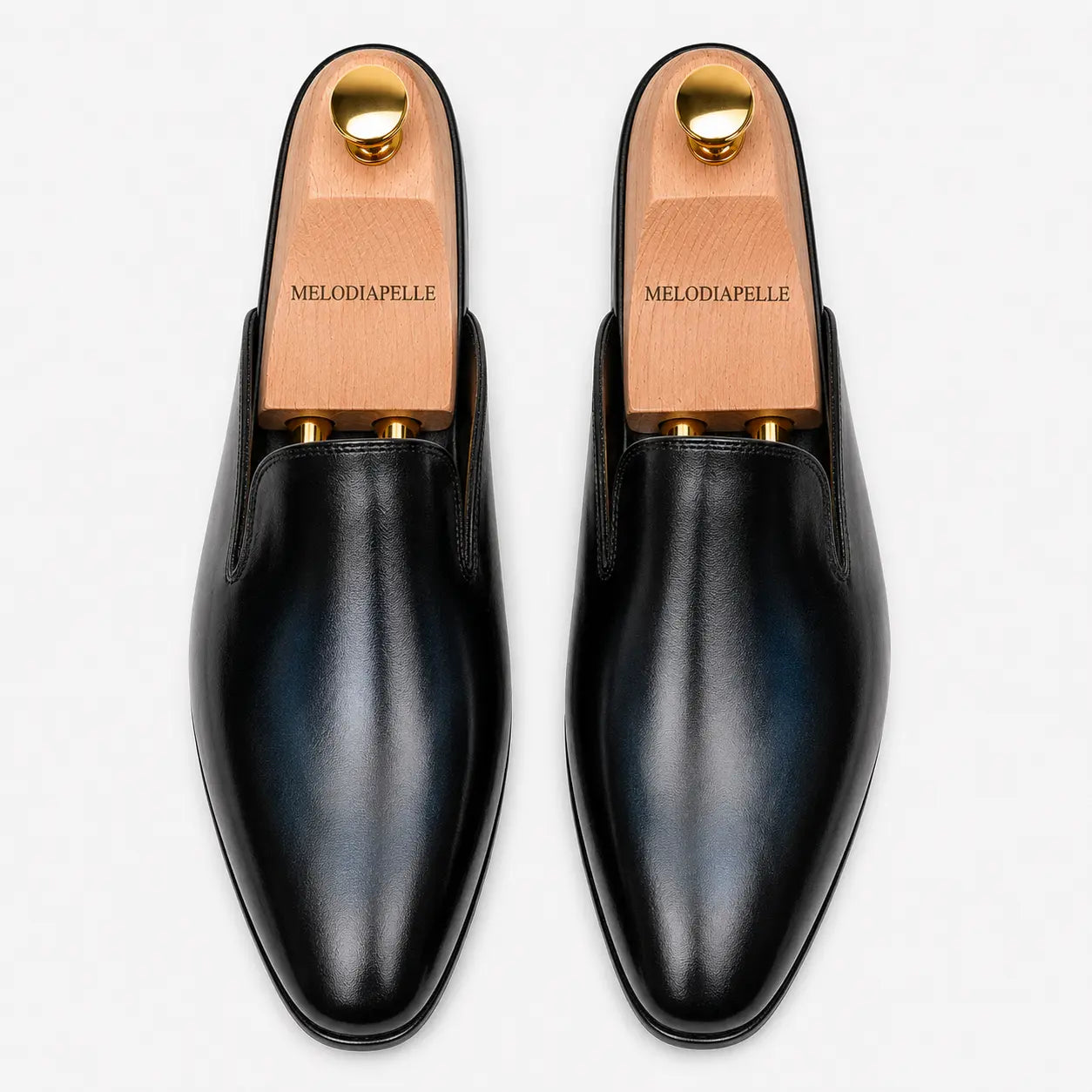 Melodiapelle Millburn Mule in navy blue leather, pair top-down view, handcrafted in Agra