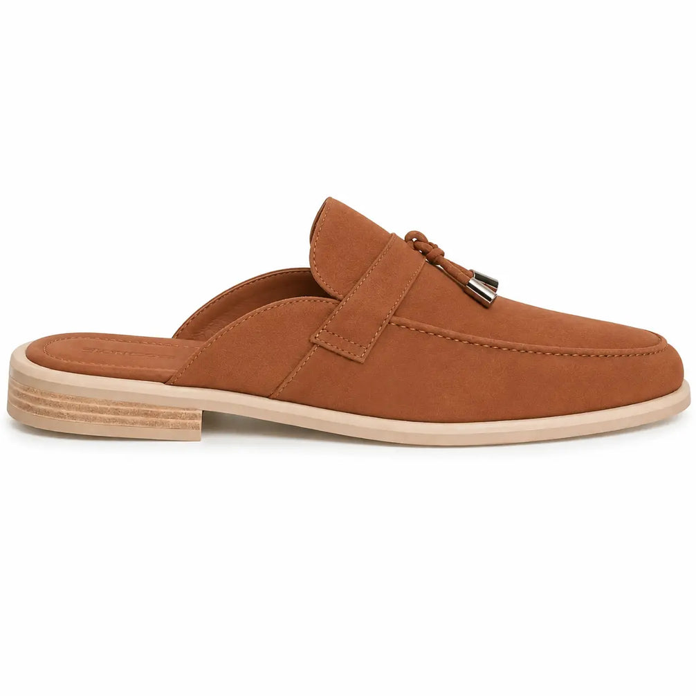 Side profile of the Millo Mule in rust tan suede on white background