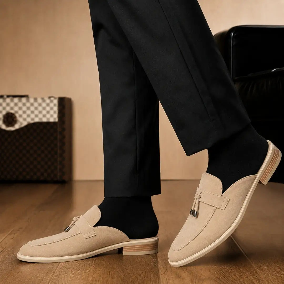 Melodiapelle Millo Mule in sand beige suede worn with trousers, on-feet shot