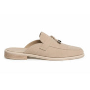 Side profile of the Millo Mule in sand beige suede on white background