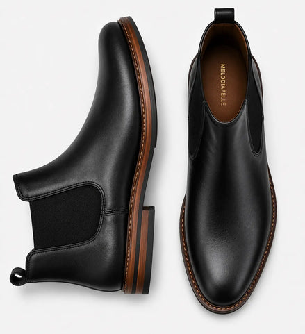 Nero black leather Chelsea boot, three-quarter angle showing heel and elastic side panel