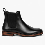 Side profile of the Mirage Chelsea Boot in nero black leather on white background