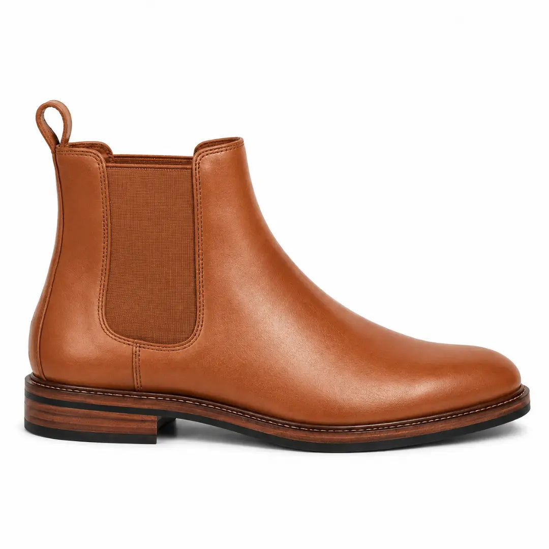Side profile of the Mirage Chelsea Boot in tan leather on white background