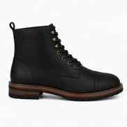 Side profile of the Miranda Cap Toe Heritage Boot in black leather on white background