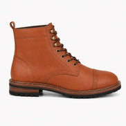 Side profile of the Miranda Cap Toe Heritage Boot in tan leather on white background