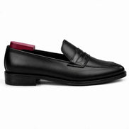 Side profile of the Mirasol Two-Tone Dress Loafer in black leather on white background