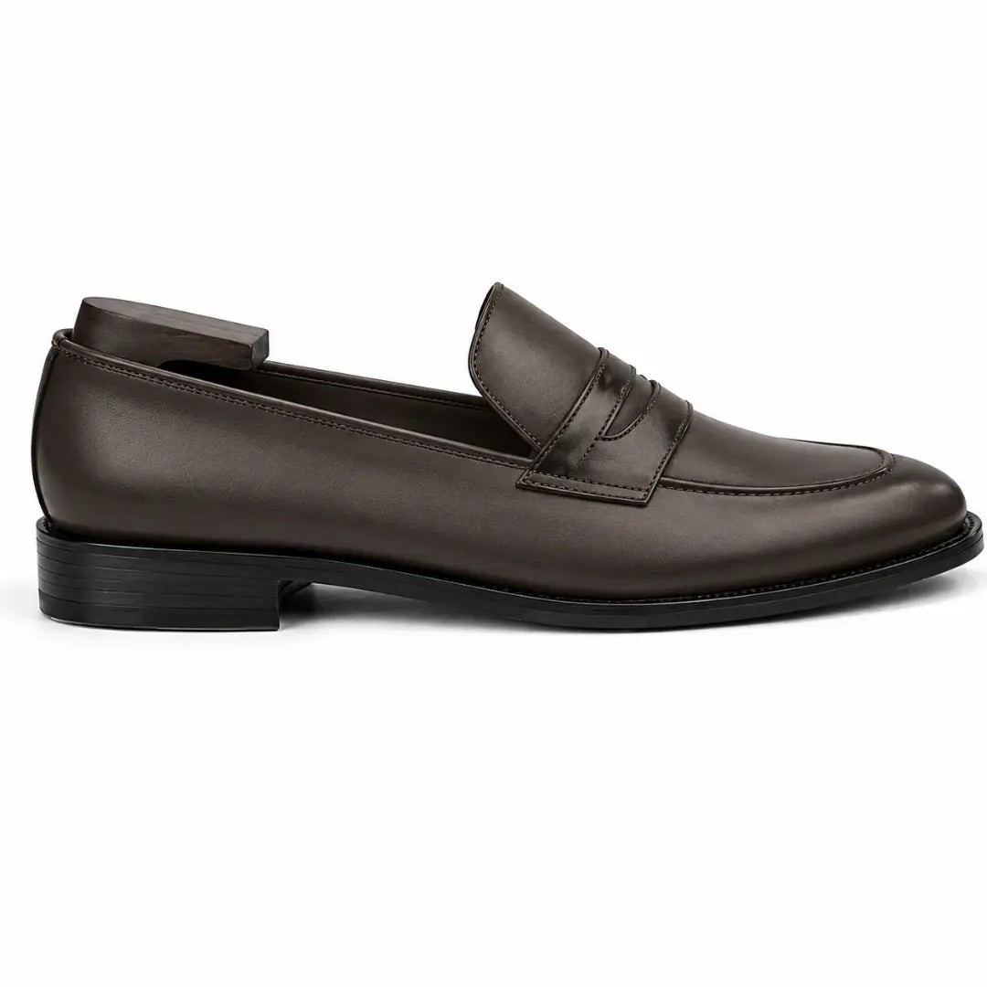 Side profile of the Mirasol Two-Tone Dress Loafer in brown leather on white background