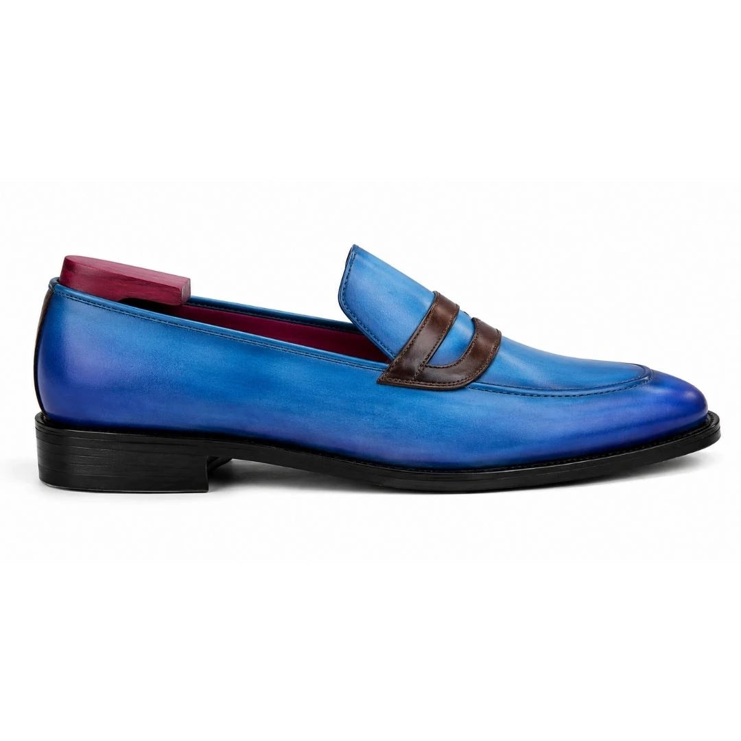 Side profile of the Mirasol Two-Tone Dress Loafer in cobalt blue and burgundy leather on white background