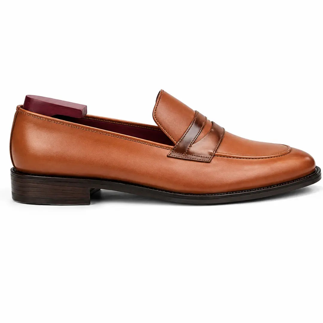 Side profile of the Mirasol Two-Tone Dress Loafer in tan leather on white background