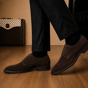 Melodiapelle Mission Classic Derby in dark brown suede worn with formal trousers, on-feet shot