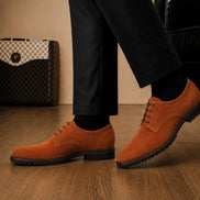 Melodiapelle Mission Classic Derby in rust tan suede worn with formal trousers, on-feet shot