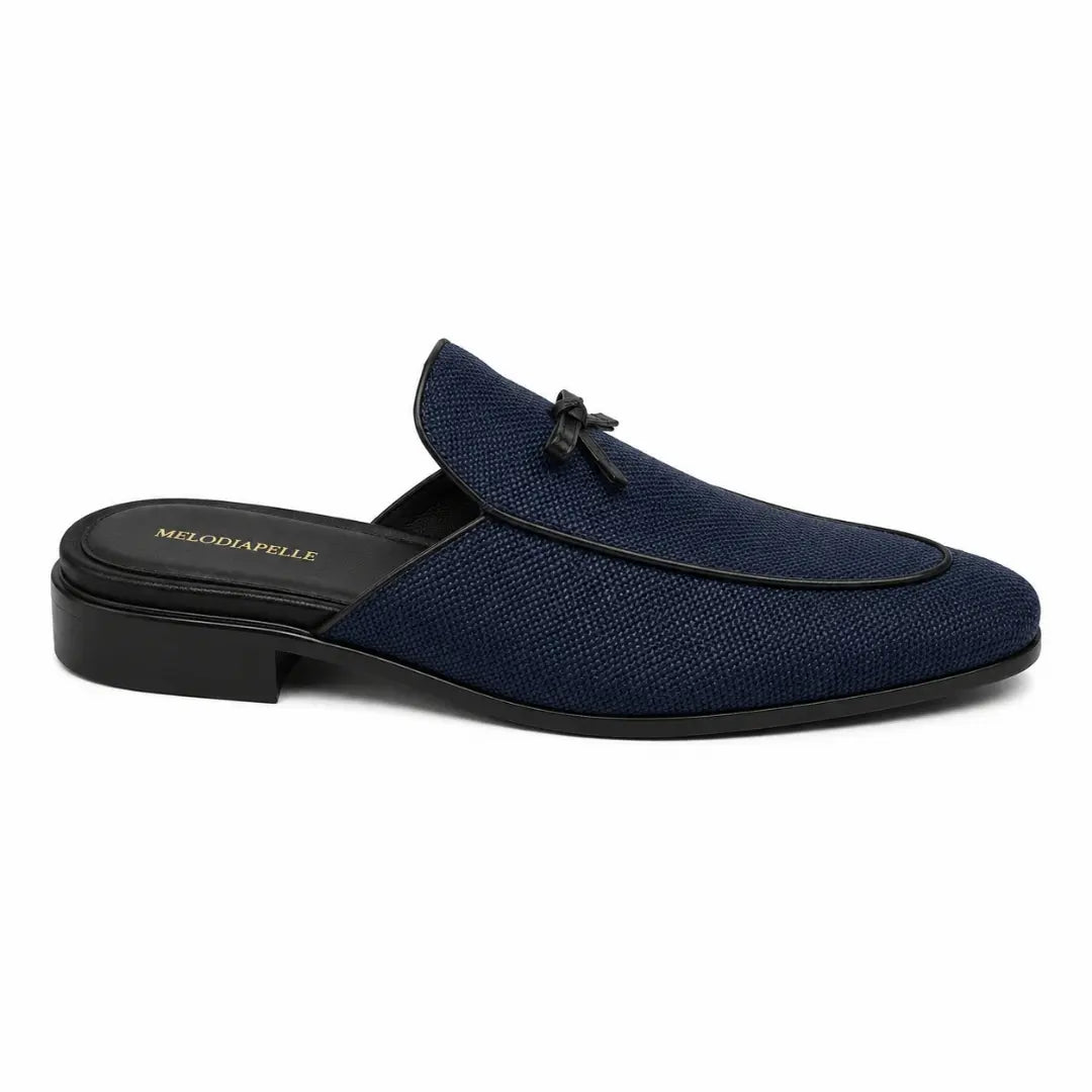 Side profile of the Missoni Mule in navy textured suede on white background