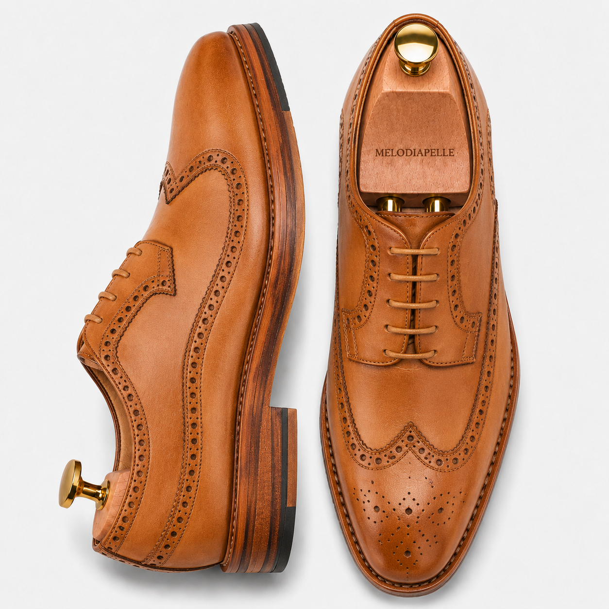 Natural tan leather longwing brogue Derby, three-quarter angle showing heel and brogue detailing