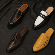 Melodiapelle Modena Mule collection in black, brown and tan leather, handcrafted penny mule loafers displayed together
