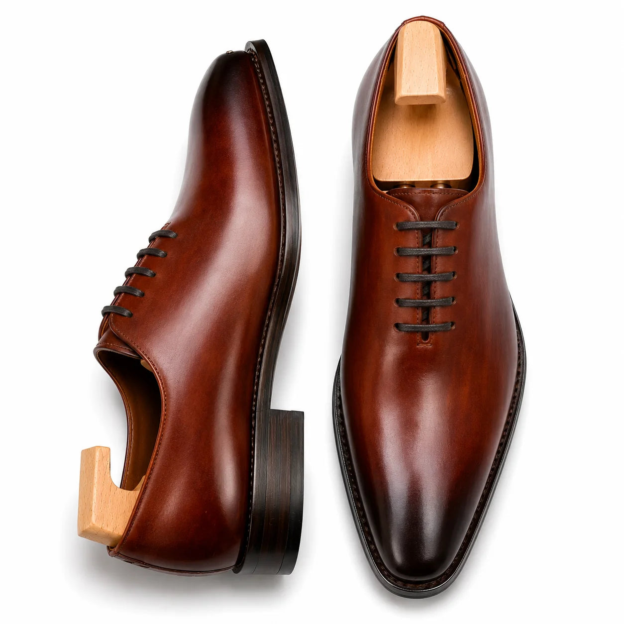 Cognac tan leather wholecut Oxford, three-quarter angle showing seamless upper and heel