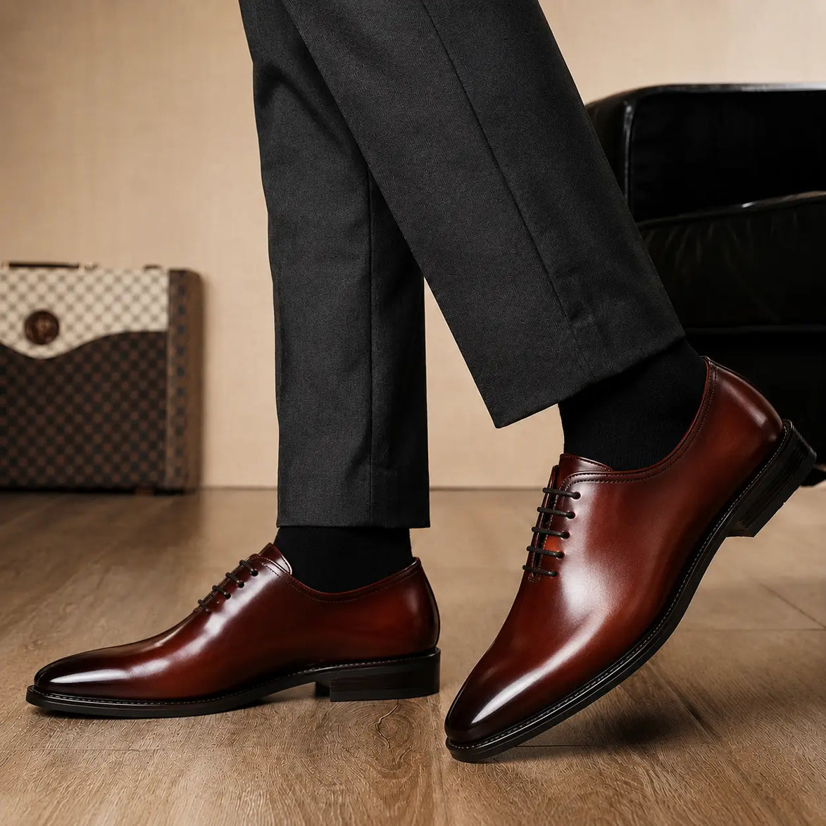 Melodiapelle Modesto Wholecut Oxford in cognac tan leather worn with formal trousers, on-feet shot