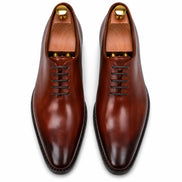 Melodiapelle Modesto Wholecut Oxford in cognac tan leather, pair top-down view, handcrafted in Agra