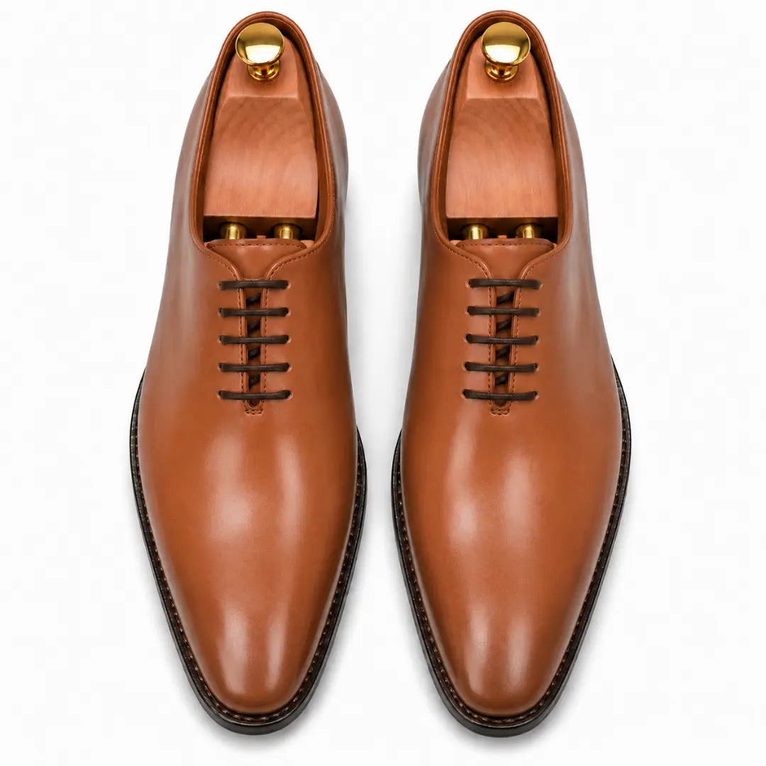 Melodiapelle Modesto Wholecut Oxford in tan leather, pair top-down view, handcrafted in Agra