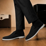 Melodiapelle Mole Mule in black suede worn with trousers, on-feet shot