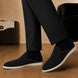 Melodiapelle Mole Mule in black suede worn with trousers, on-feet shot