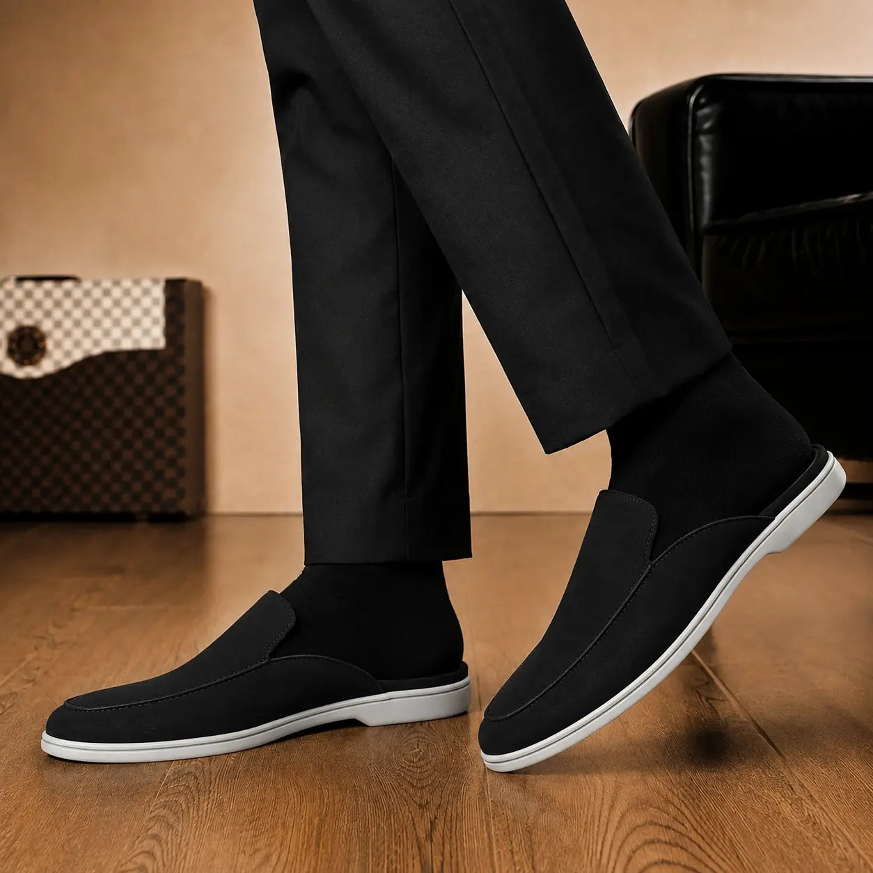Melodiapelle Mole Mule in black suede worn with trousers, on-feet shot