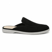 Side profile of the Mole Mule in black suede on white background