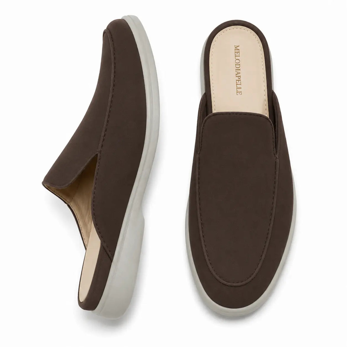 Dark brown suede backless mule slipper, three-quarter angle showing heel and sole detailing