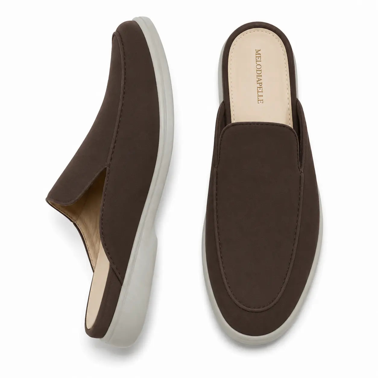 Dark brown suede backless mule slipper, three-quarter angle showing heel and sole detailing