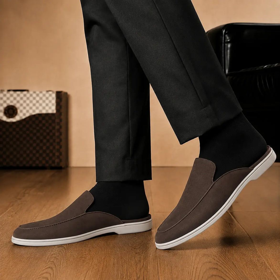 Melodiapelle Mole Mule in dark brown suede worn with trousers, on-feet shot
