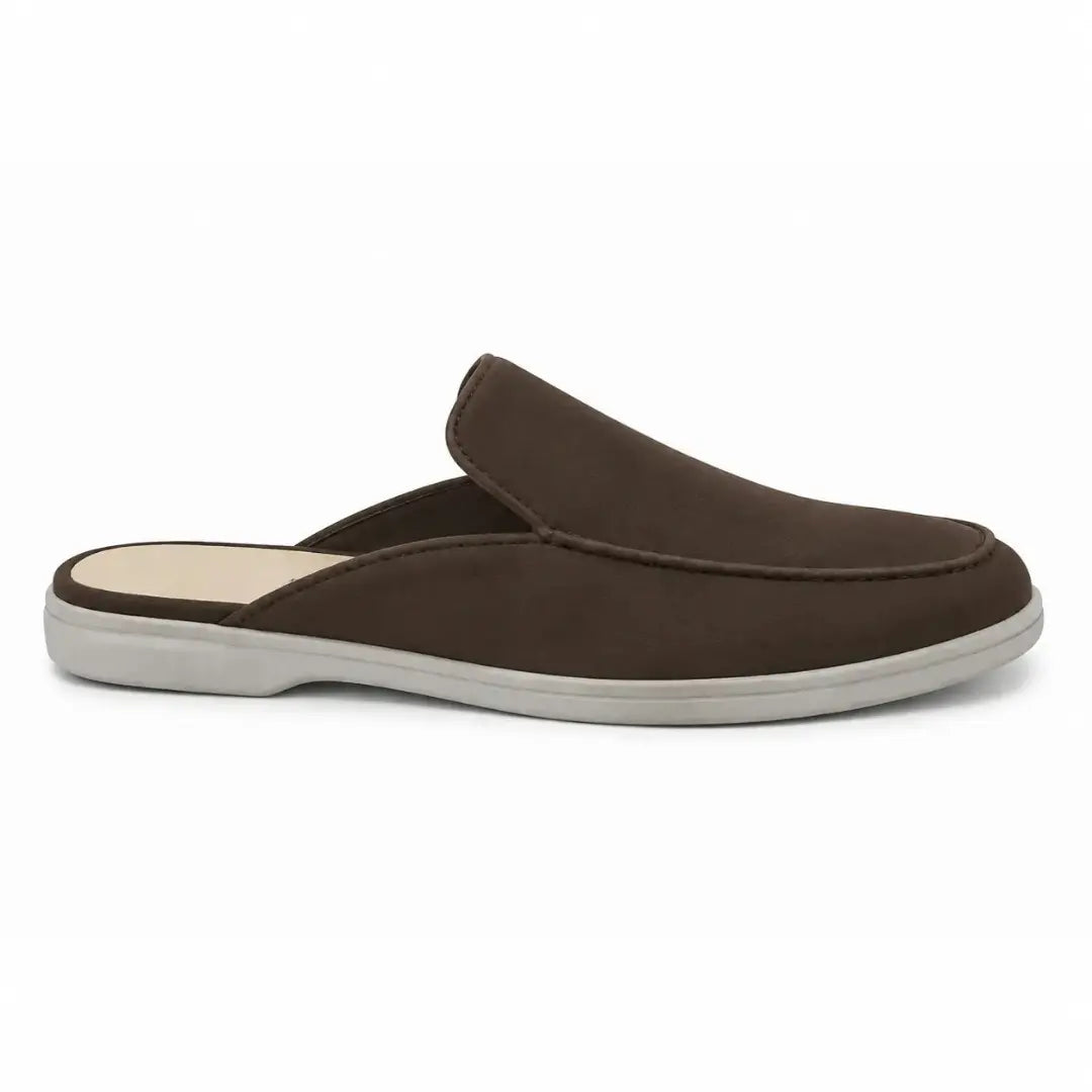Side profile of the Mole Mule in dark brown suede on white background
