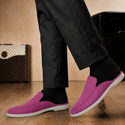 Melodiapelle Mole Mule in magenta pink suede worn with trousers, on-feet shot